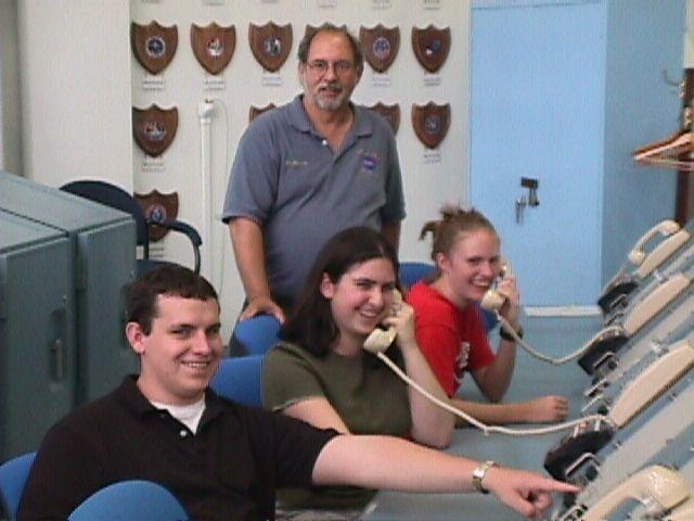 Scott, Lisa, and Elise pratice running launch ops while Mr. S.ith observes