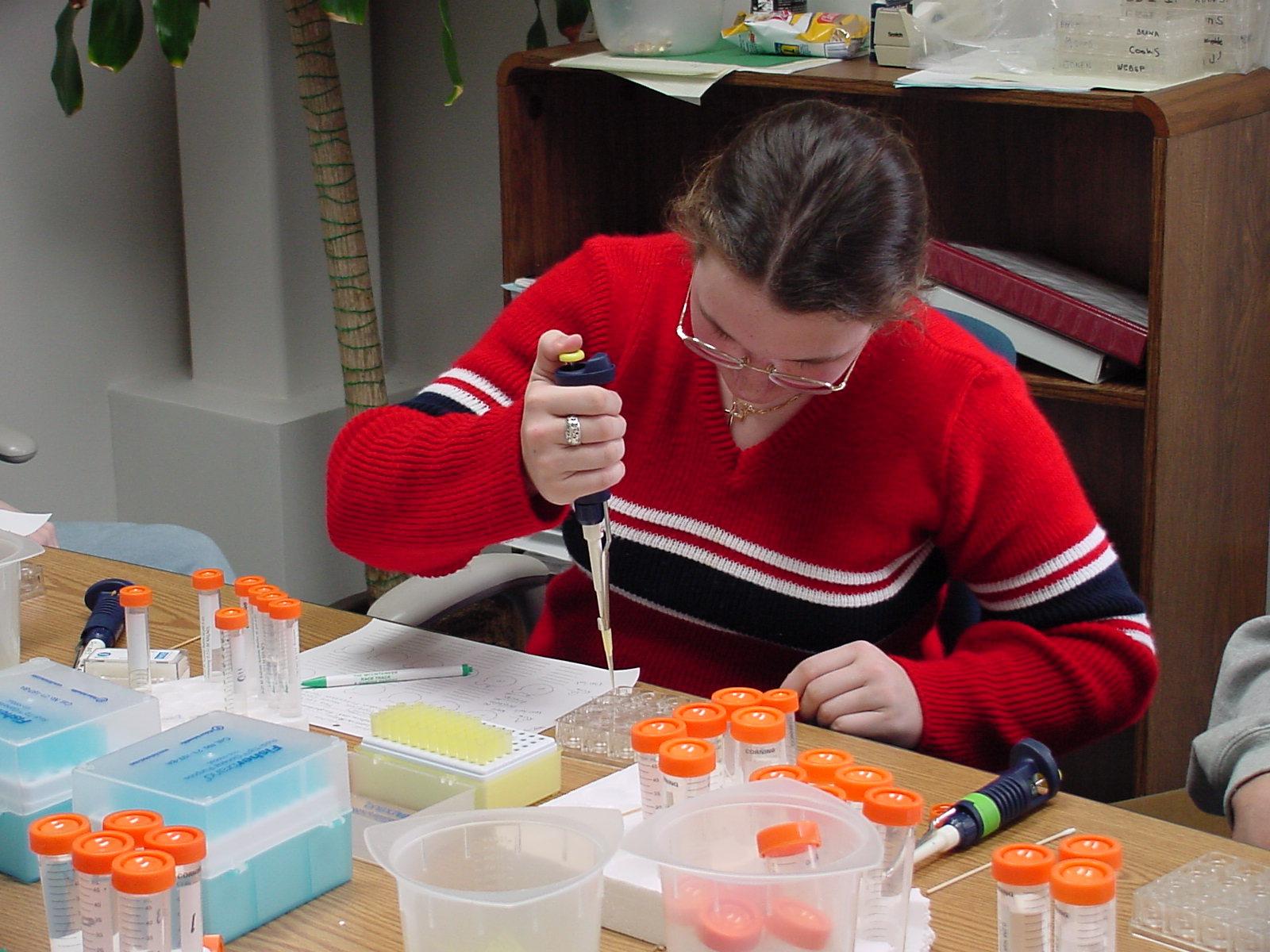Jessica C. from Eau Gallie High School setting up her series of 'vapor diffusion' samples
