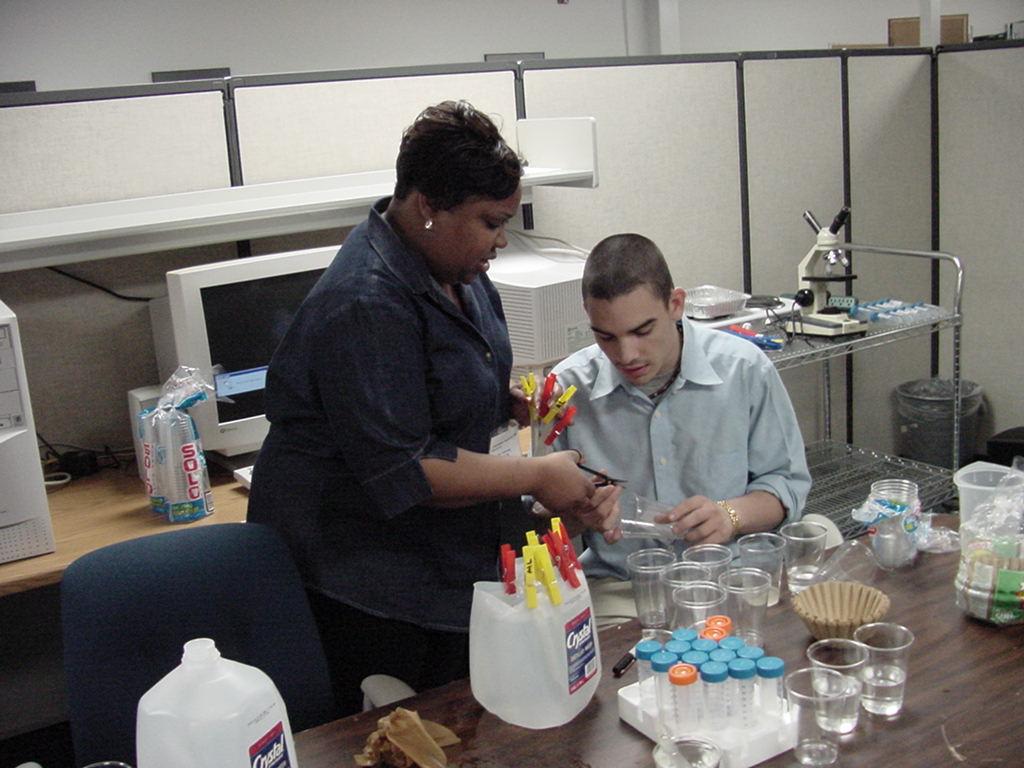 Felicia working with student assistant, Nate Kenny, from Land O' Lakes High School