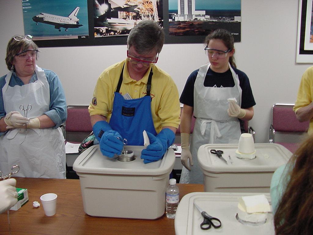 Dave Hall submerses a flight sample in liquid Nitrogen