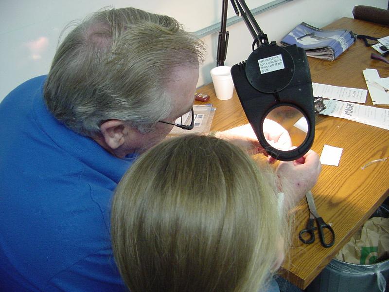 Student gets a 'bird's eye view' as Wendell Elrod checks a flight sample