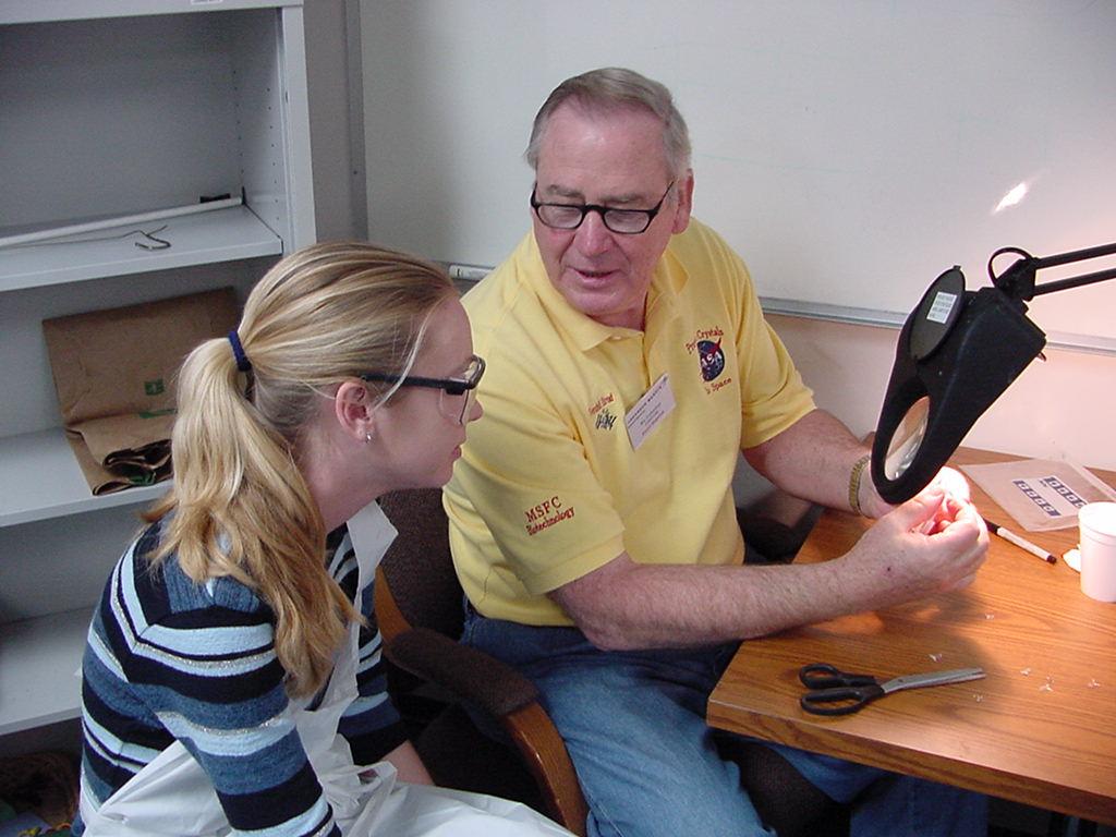 Wendell Elrod describes the final quality check with a student