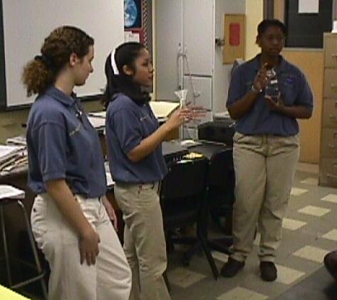 Carolyn, Maricar, and NaLonda describe the lab activity