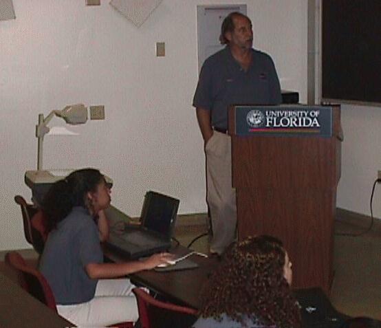 Leticia Otero assisting in Power Point presentation